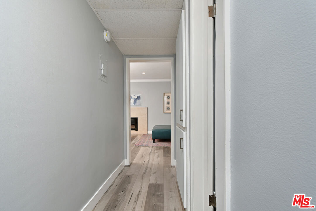 2345 Roscomare Road, Unit 205 Los Angeles, CA 90077 - Photo 24 of 50 a view of a bedroom from a hallway
