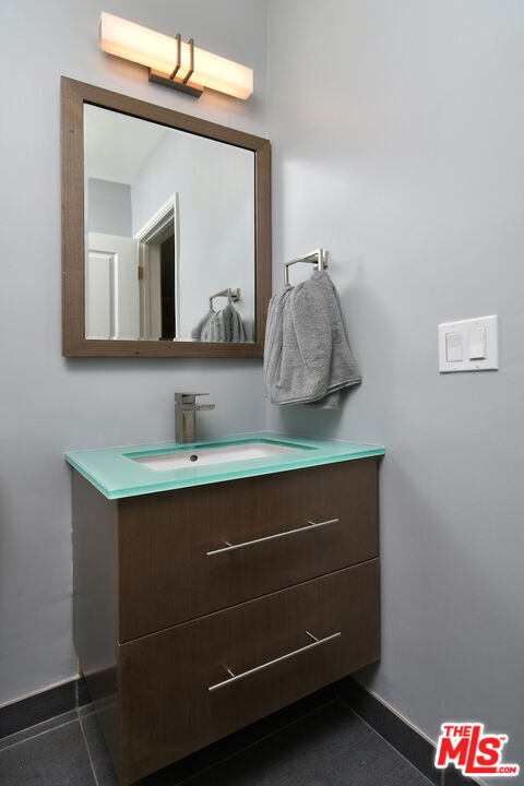2345 Roscomare Road, Unit 205 Los Angeles, CA 90077 - Photo 34 of 50 a bathroom with a sink and a mirror