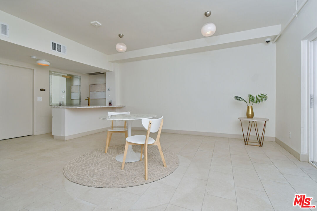 2345 Roscomare Road, Unit 205 Los Angeles, CA 90077 - Photo 36 of 50 a workspace with table and chair