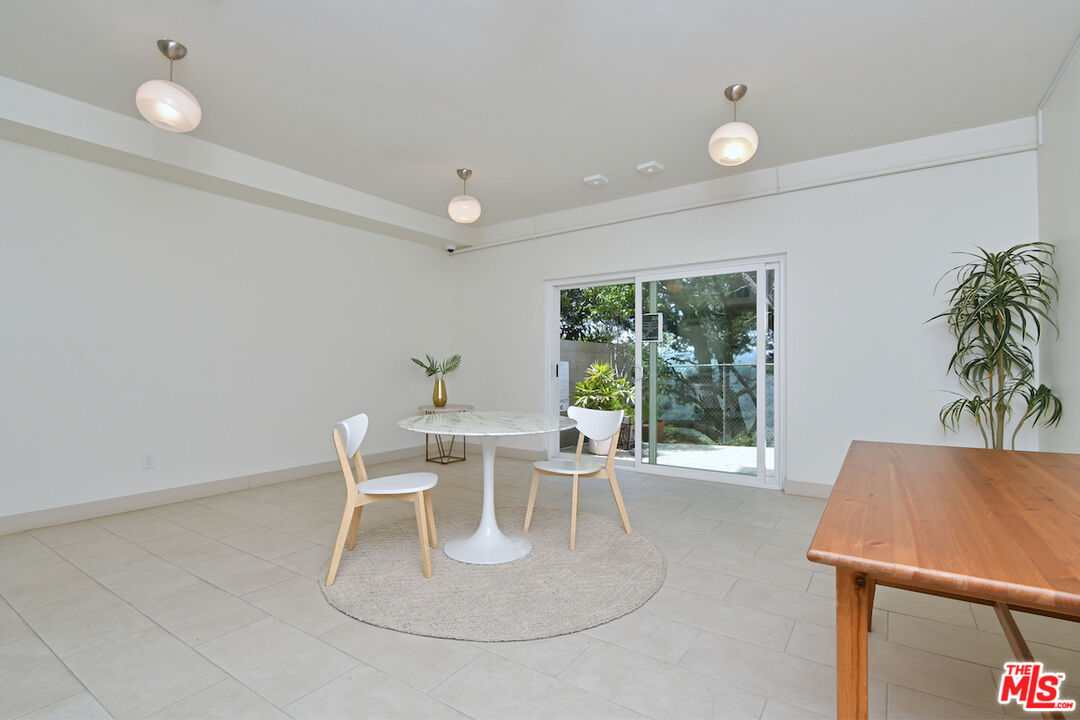2345 Roscomare Road, Unit 205 Los Angeles, CA 90077 - Photo 37 of 50 a work room with furniture and a potted plant