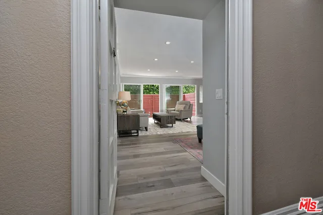 a view of a living room and dining room
