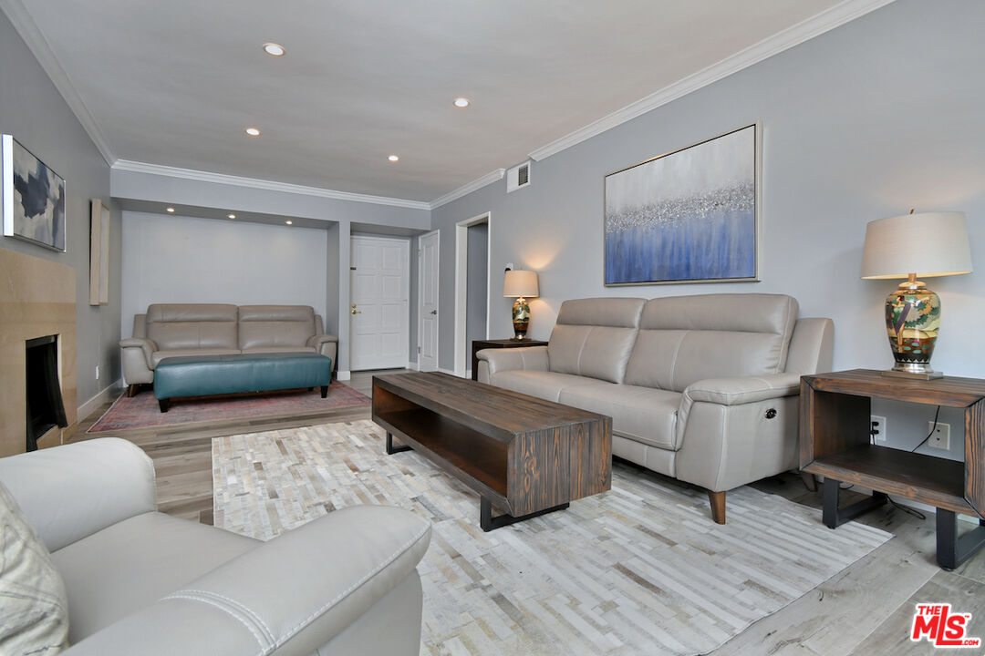 2345 Roscomare Road, Unit 205 Los Angeles, CA 90077 - Photo 10 of 50 a living room with furniture and a couch