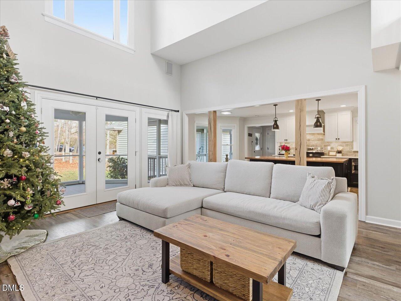274 Powers Country Lane Bennett, NC 27208 - Photo 13 of 62 a living room with furniture and a potted plant