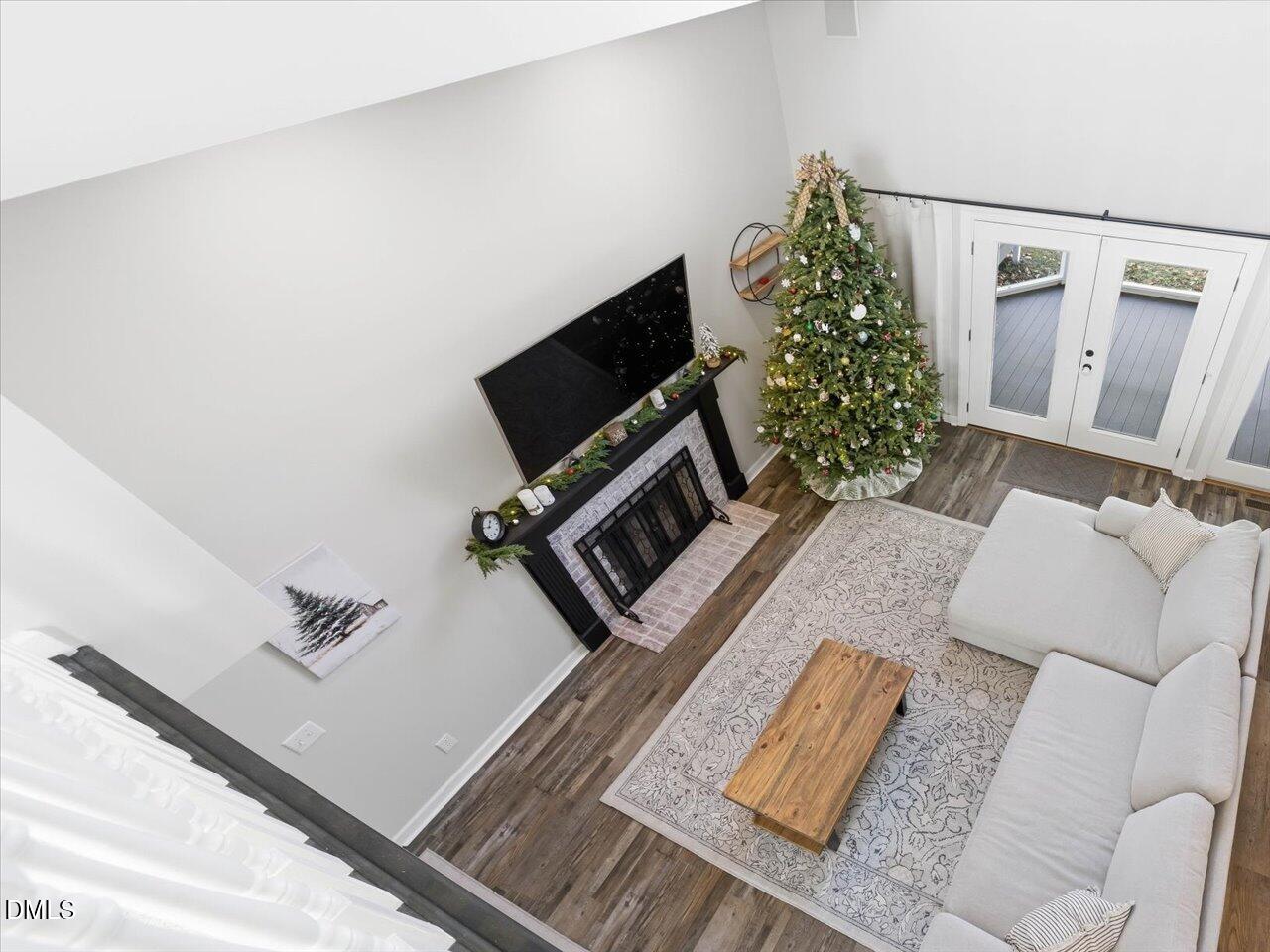 274 Powers Country Lane Bennett, NC 27208 - Photo 30 of 62 a living room with furniture and a flat screen tv