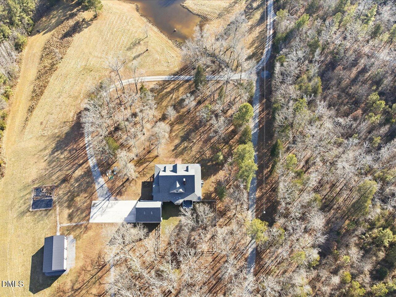 274 Powers Country Lane Bennett, NC 27208 - Photo 55 of 62 a picture of a tree in front of a house
