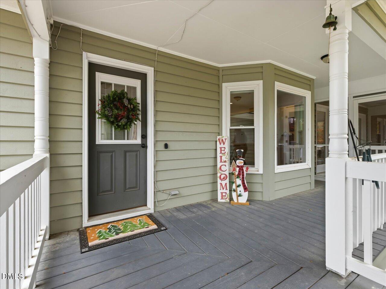 274 Powers Country Lane Bennett, NC 27208 - Photo 7 of 62 a view of house with wooden floor and wooden floor