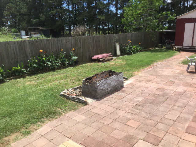 21911 Hubbard Road Robertsdale, AL 36567 - Photo 8 of 17 BBQ pit