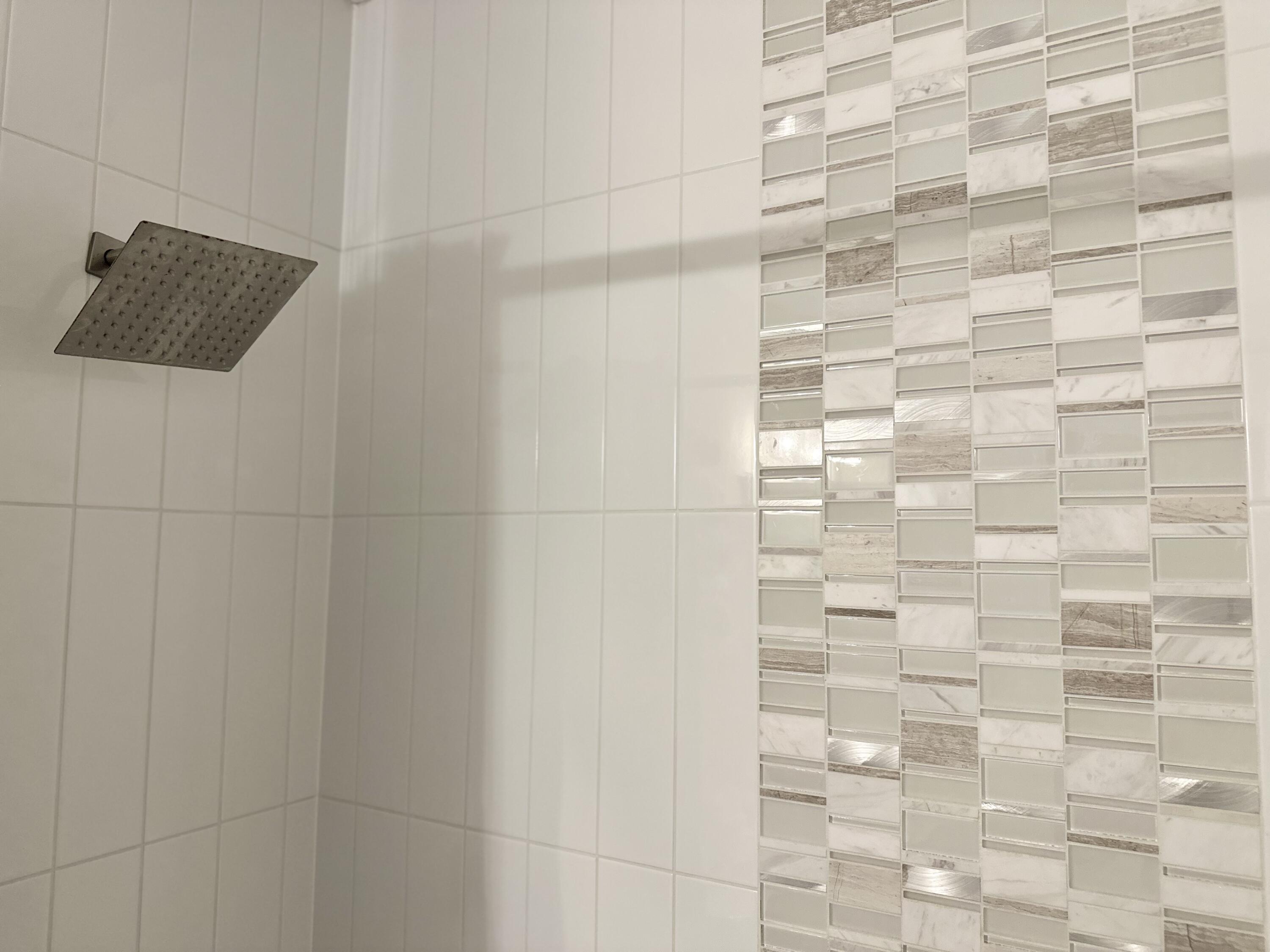 64 Cross Creek Road, Unit 20C Miramar Beach, FL 32550 - Photo 24 of 28 a bathroom with a shower