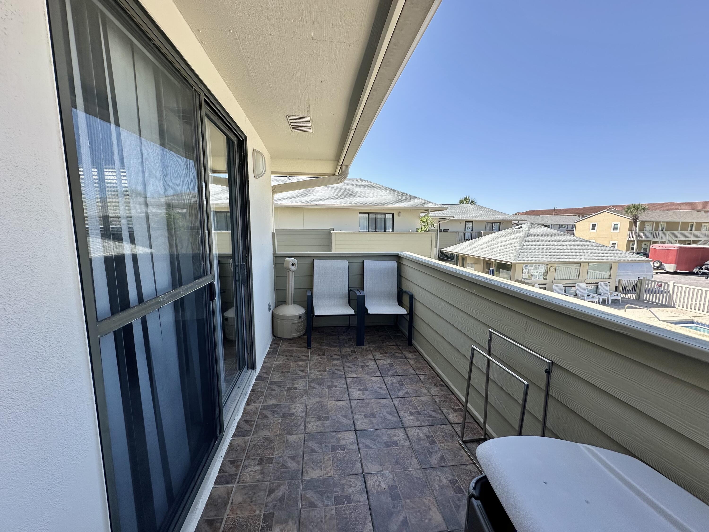 64 Cross Creek Road, Unit 20C Miramar Beach, FL 32550 - Photo 5 of 28 a view of a hallway with furniture