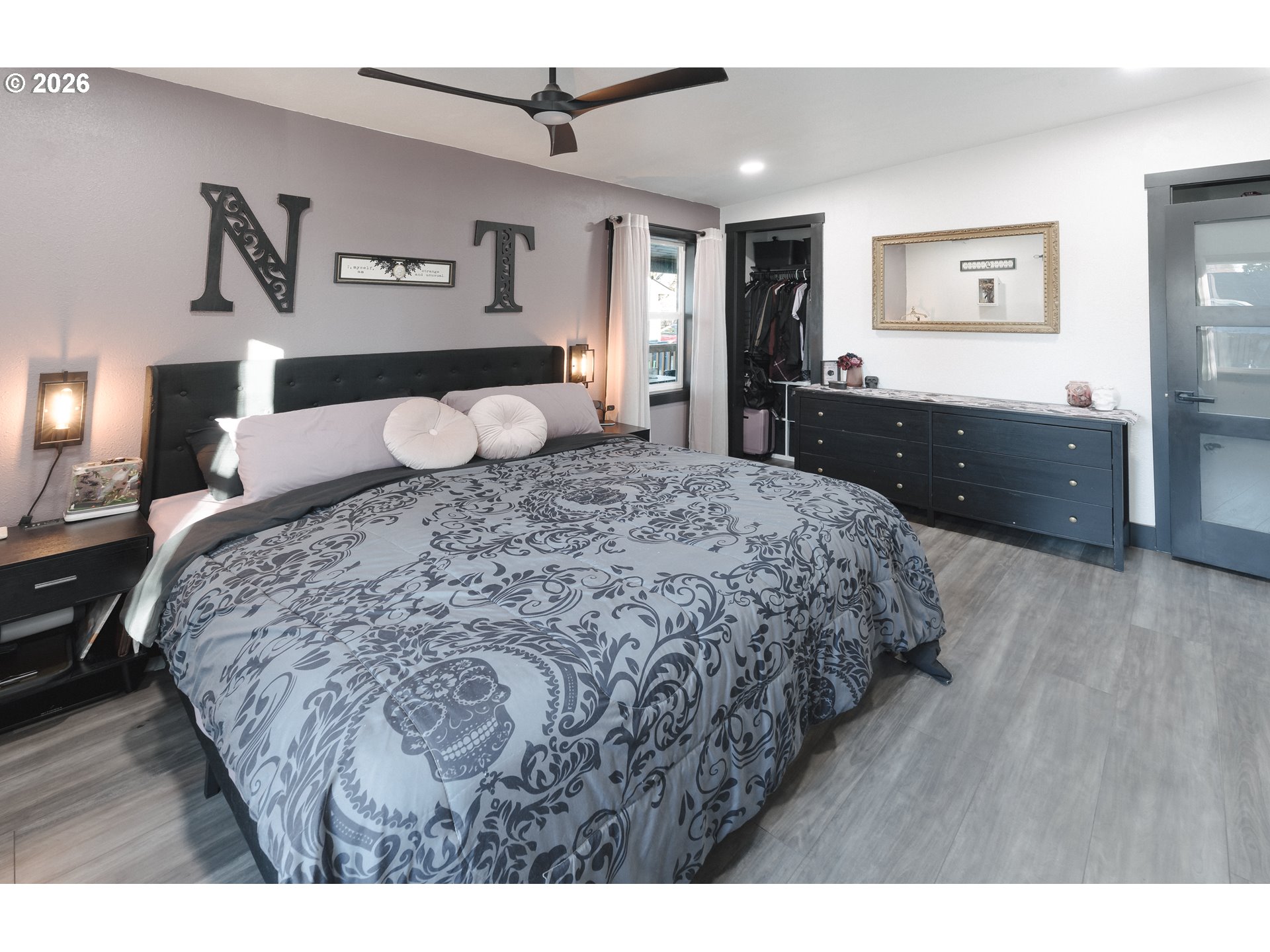 153 Southeast James Street Camas, WA 98607 - Photo 20 of 35 a bedroom with a bed and a dresser