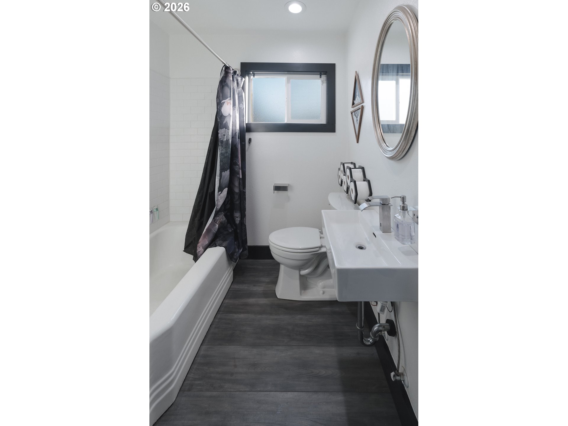 153 Southeast James Street Camas, WA 98607 - Photo 22 of 35 a bathroom with a sink and a mirror