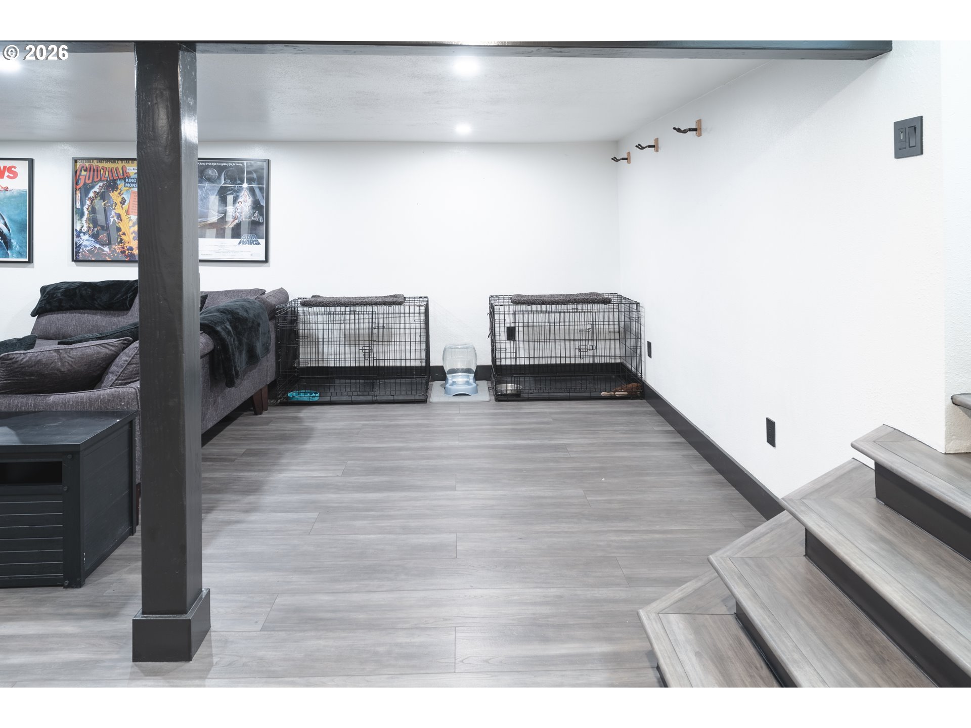 153 Southeast James Street Camas, WA 98607 - Photo 25 of 35 a living room with furniture and a wooden floor