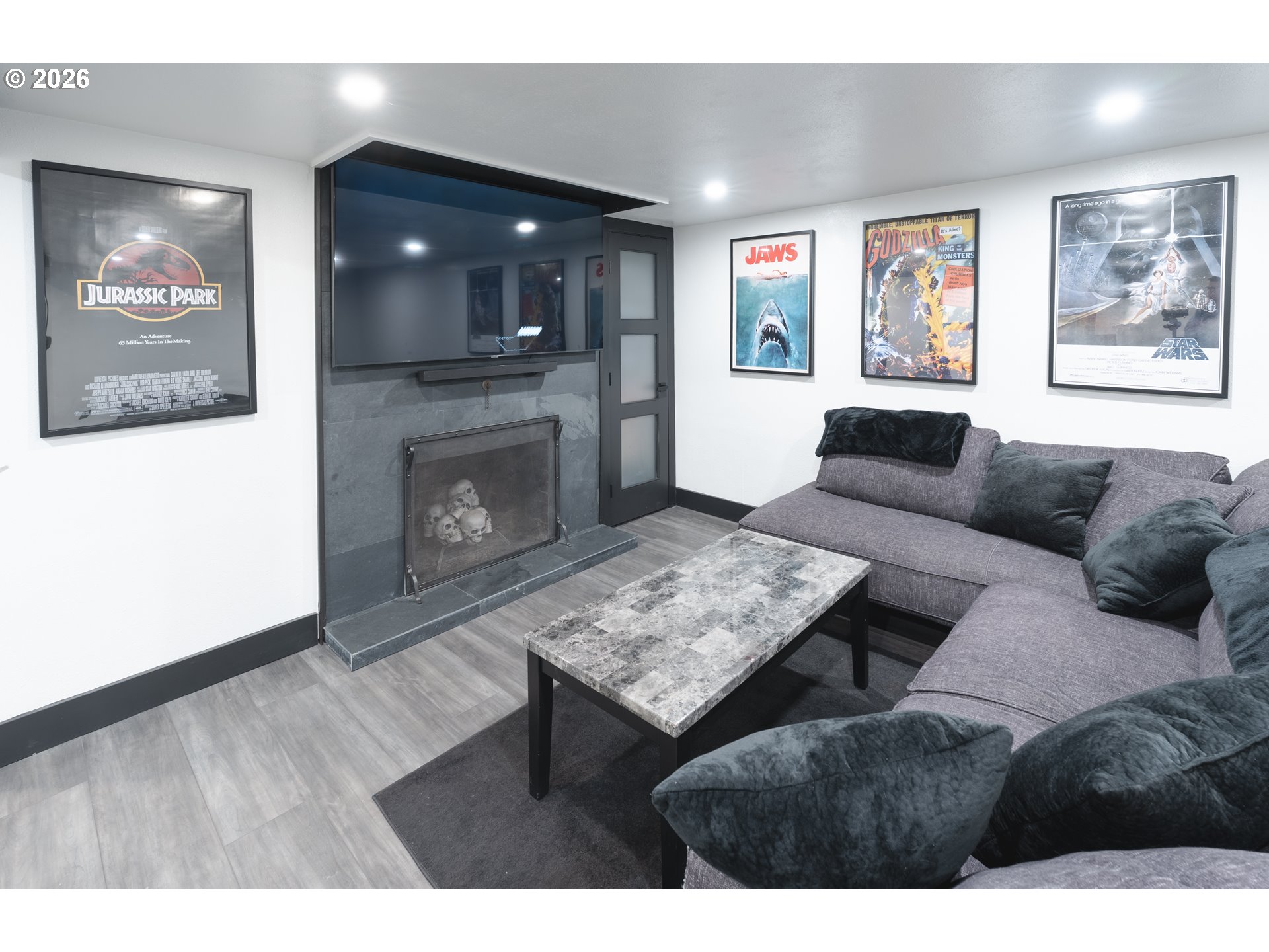 153 Southeast James Street Camas, WA 98607 - Photo 26 of 35 a living room with furniture and a fireplace