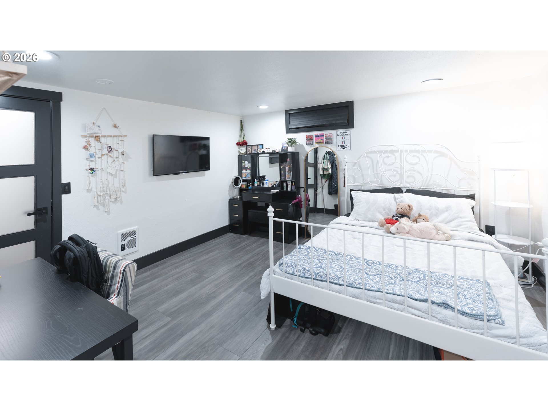 153 Southeast James Street Camas, WA 98607 - Photo 29 of 35 a living room with furniture and a flat screen tv