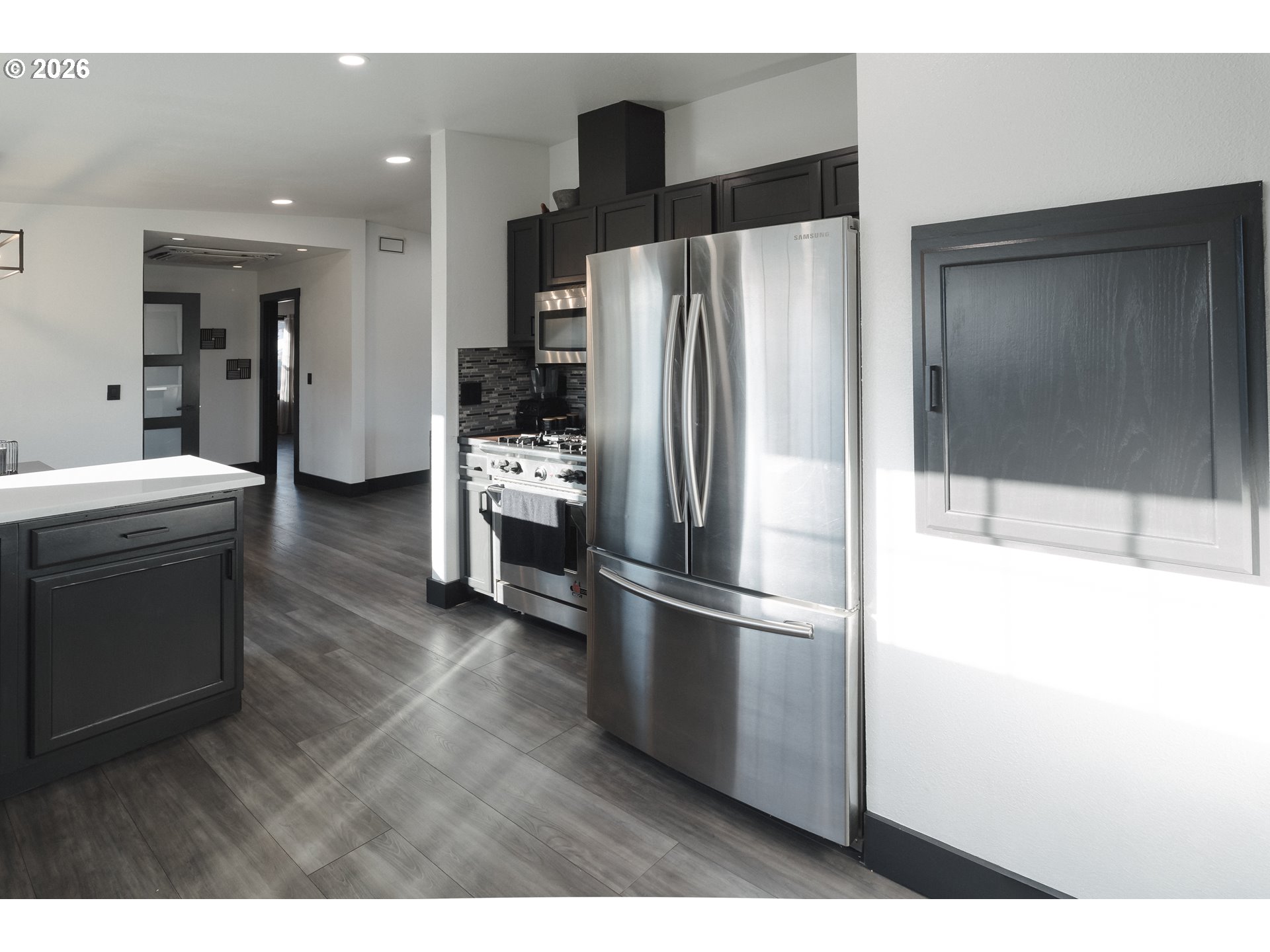 153 Southeast James Street Camas, WA 98607 - Photo 7 of 35 a kitchen with stainless steel appliances a refrigerator and a stove