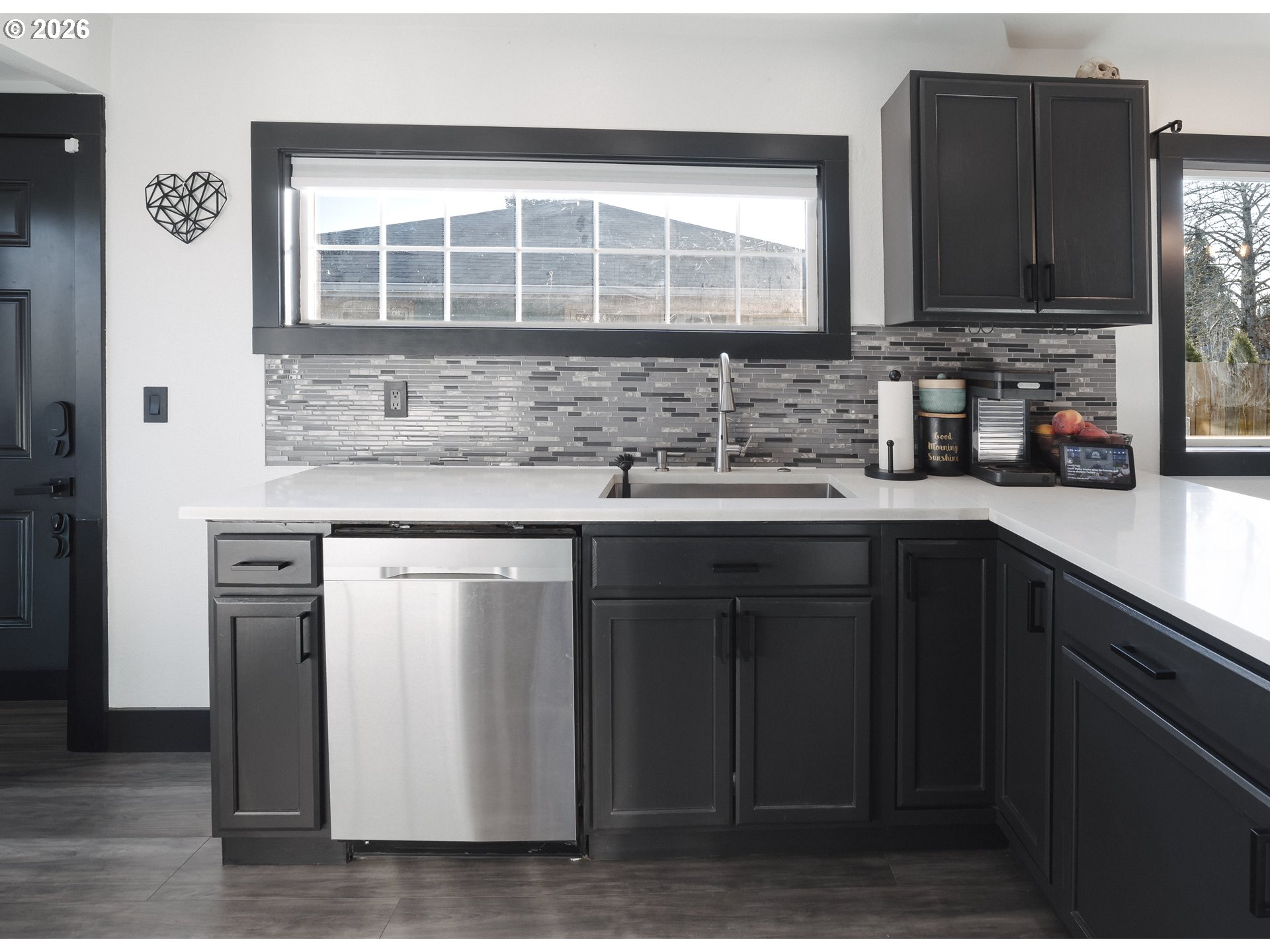 153 Southeast James Street Camas, WA 98607 - Photo 9 of 35 a kitchen with stainless steel appliances granite countertop a sink stove and cabinets