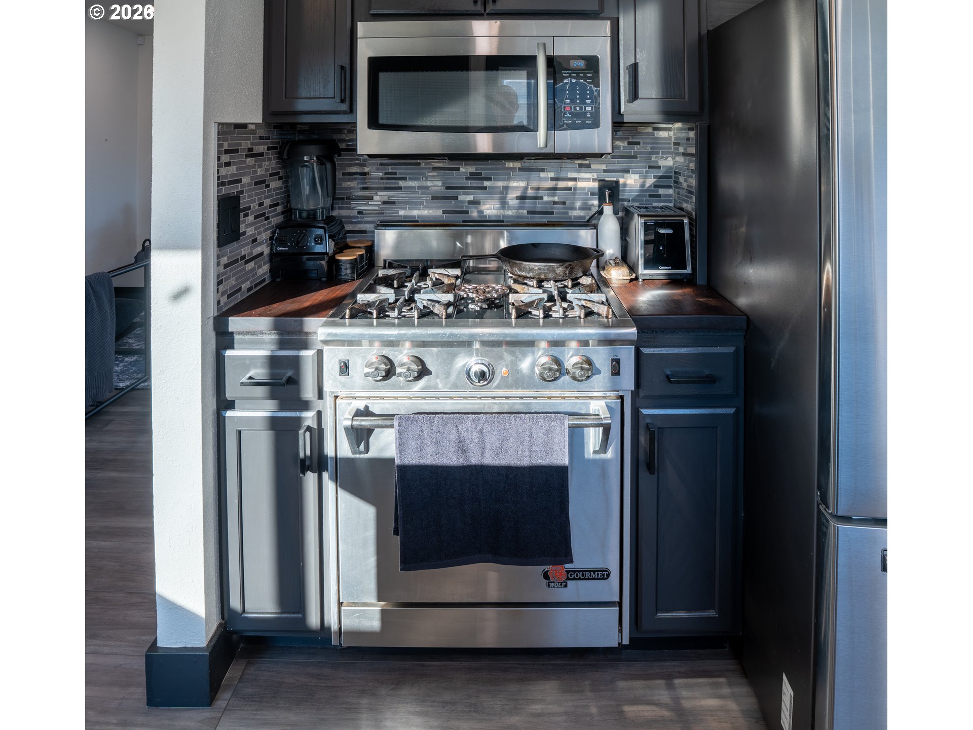 153 Southeast James Street Camas, WA 98607 - Photo 10 of 35 a stove top oven sitting inside of a kitchen