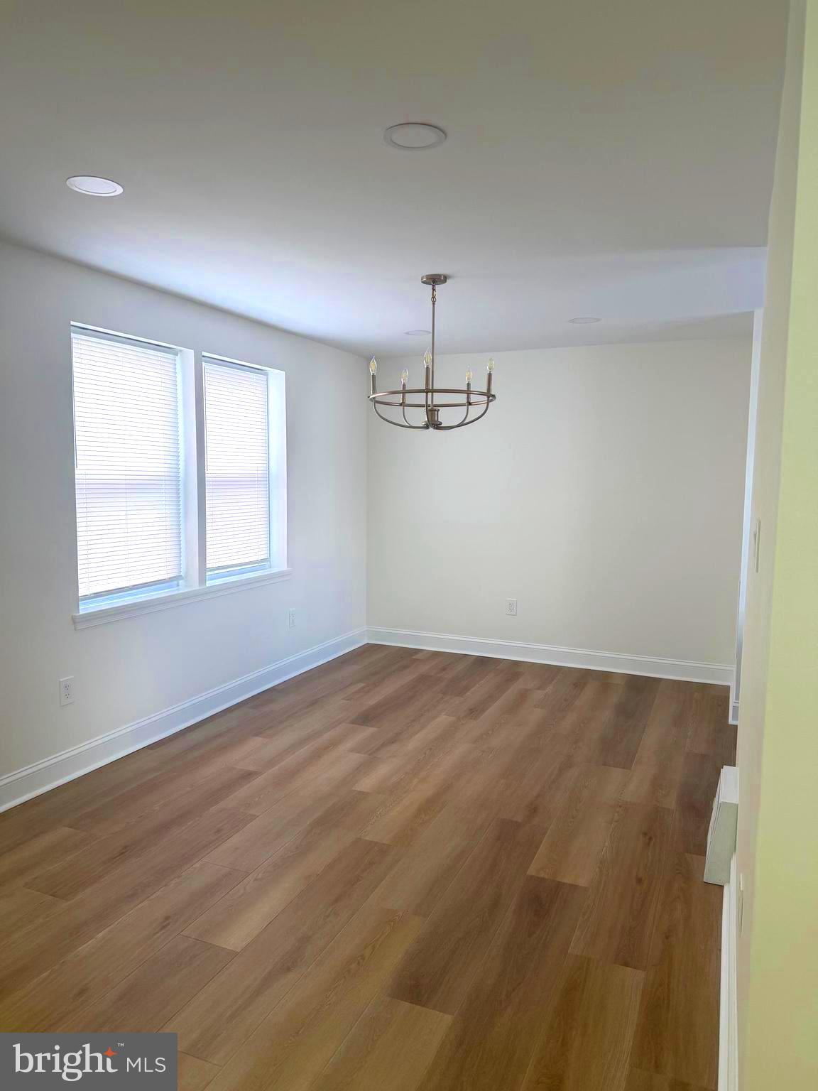 306 Brentwood Road Havertown, PA 19083 - Photo 12 of 48 wooden floor in an empty room with a window