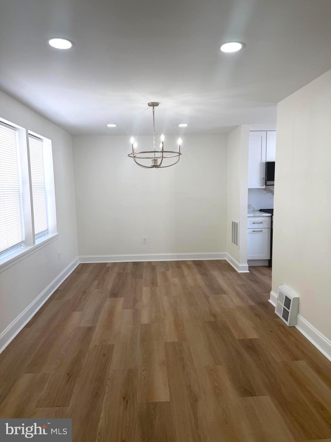 306 Brentwood Road Havertown, PA 19083 - Photo 15 of 48 wooden floor in an empty room with a window