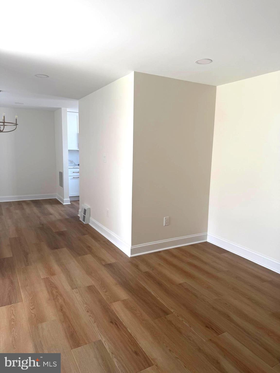 306 Brentwood Road Havertown, PA 19083 - Photo 16 of 48 a view of an empty room with wooden floor