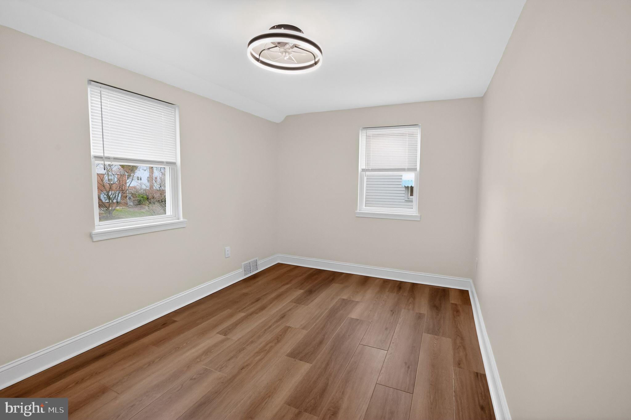 306 Brentwood Road Havertown, PA 19083 - Photo 26 of 48 wooden floor in an empty room with a window