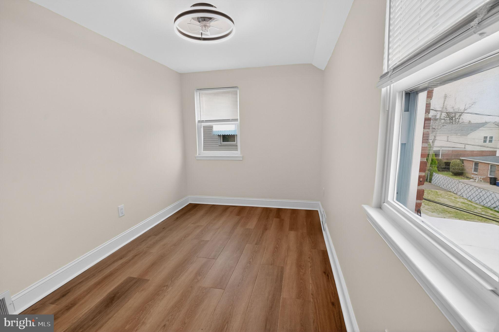 306 Brentwood Road Havertown, PA 19083 - Photo 27 of 48 a view of a room with wooden floor and a window