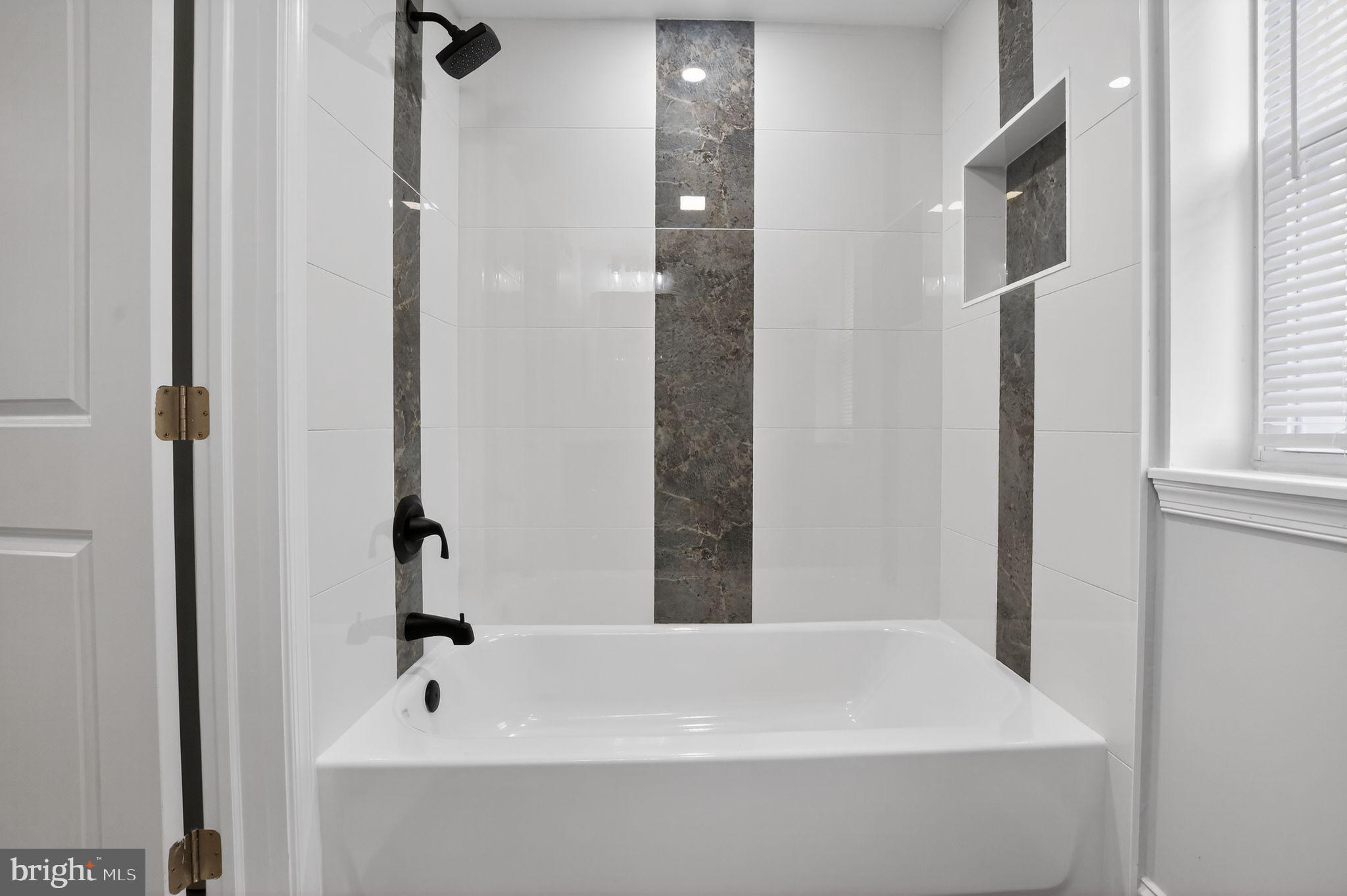 306 Brentwood Road Havertown, PA 19083 - Photo 29 of 48 a bathroom with a bathtub