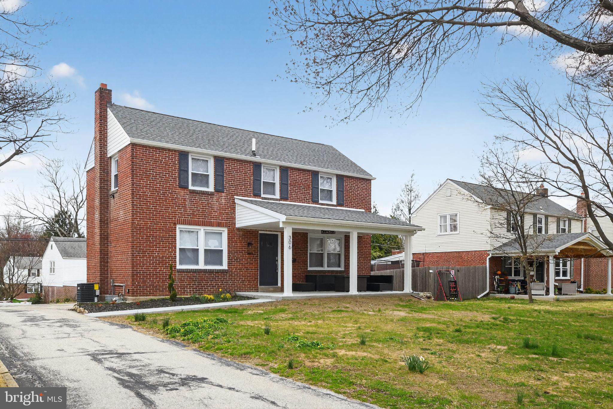 306 Brentwood Road Havertown, PA 19083 - Photo 33 of 48 a front view of a house with a garden