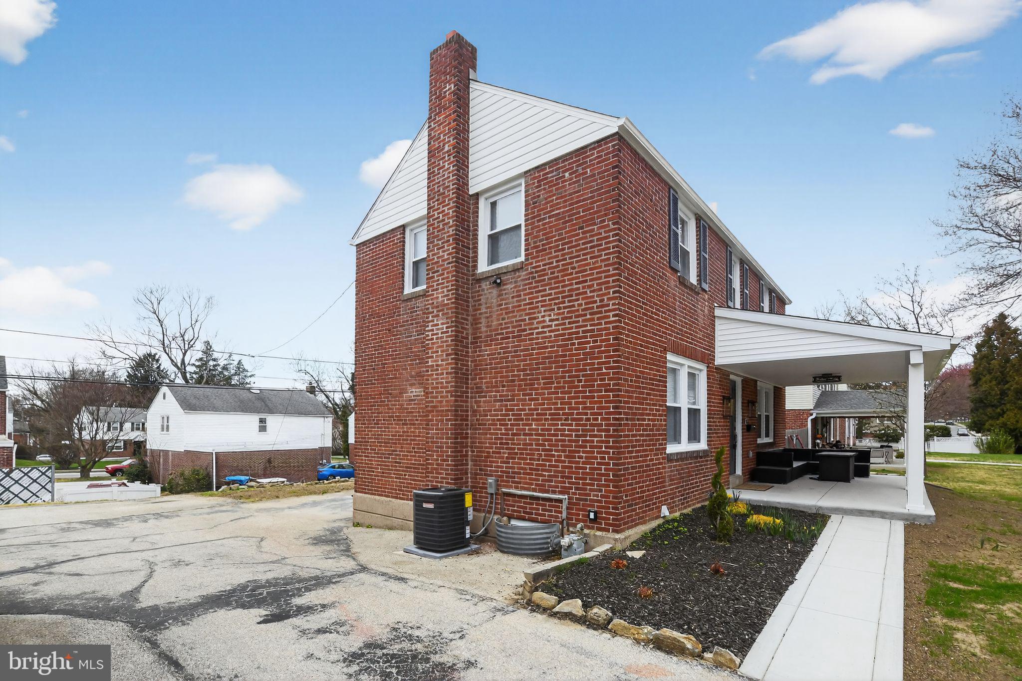 306 Brentwood Road Havertown, PA 19083 - Photo 39 of 48 a view of a house with a patio