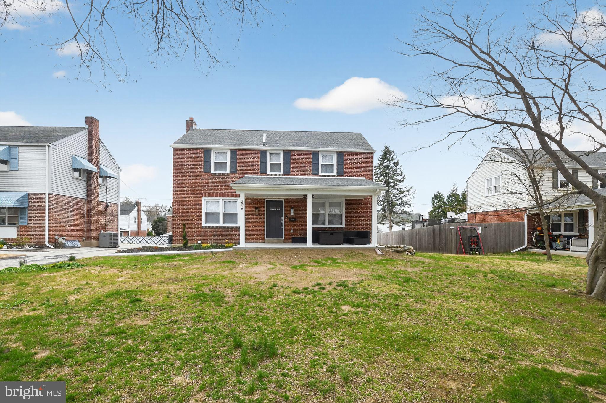 306 Brentwood Road Havertown, PA 19083 - Photo 43 of 48 a big house with a big yard and large trees