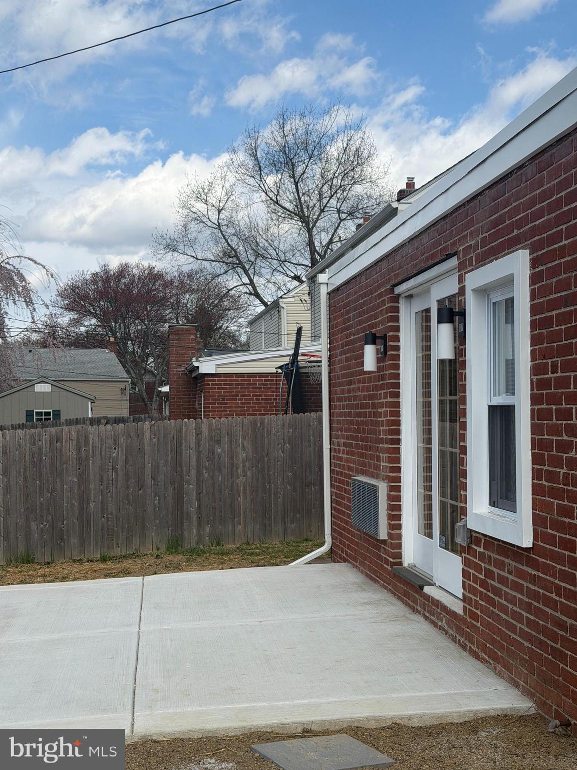 306 Brentwood Road Havertown, PA 19083 - Photo 45 of 48 a view of a brick house with a large parking space