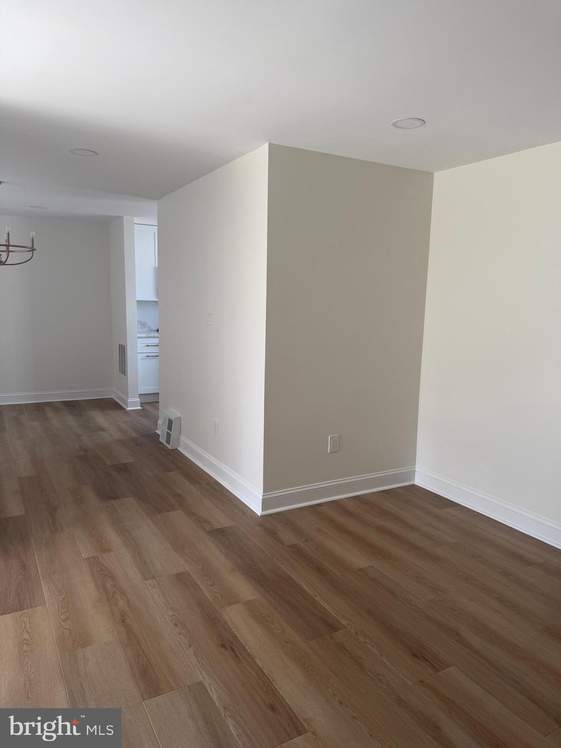 306 Brentwood Road Havertown, PA 19083 - Photo 9 of 48 a view of an empty room with wooden floor