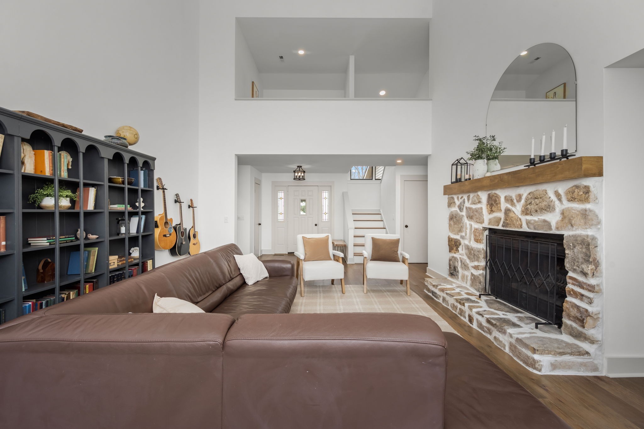 268 Davis Road Wartrace, TN 37183 - Photo 23 of 74 a living room with furniture a fireplace and a book shelf