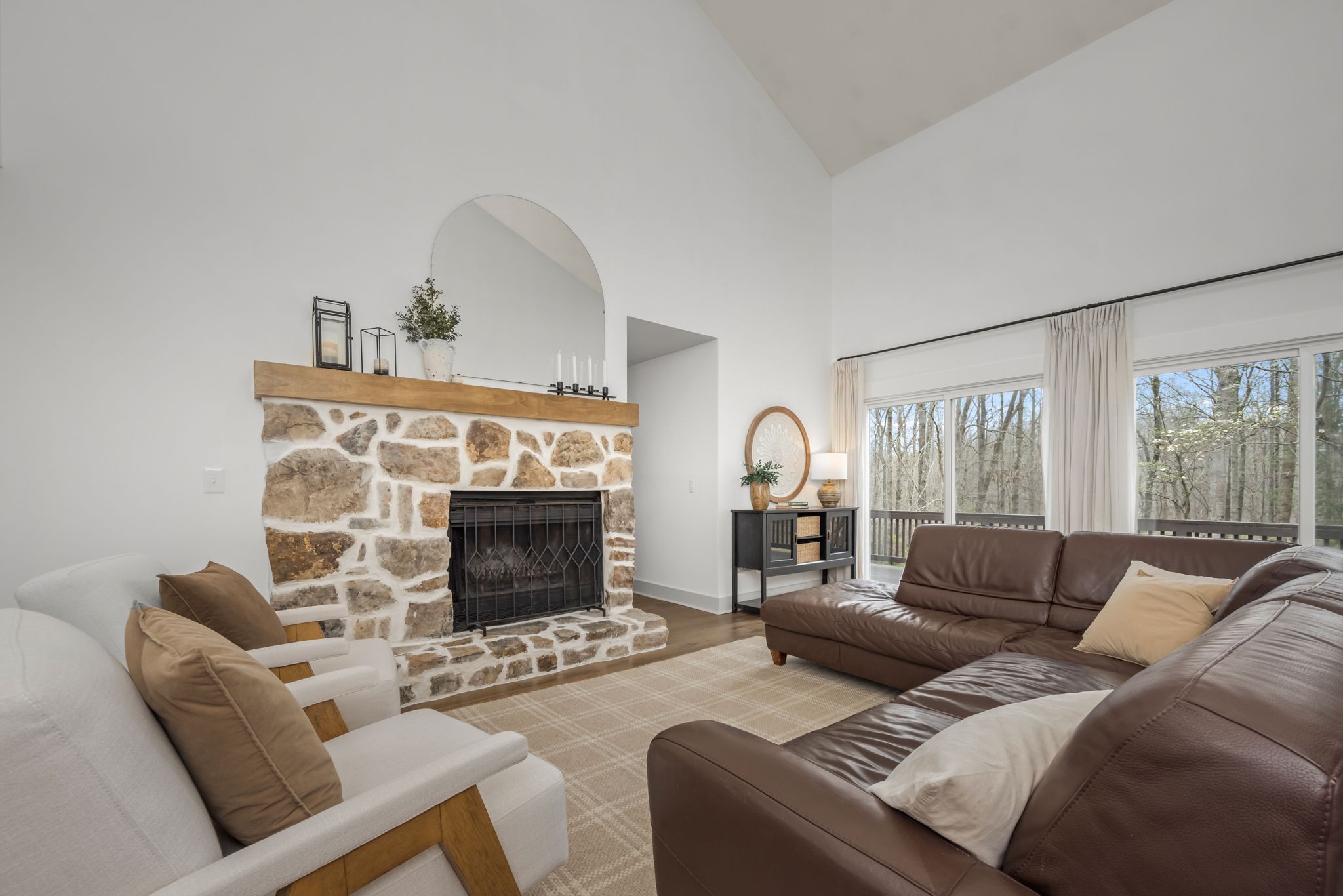 268 Davis Road Wartrace, TN 37183 - Photo 25 of 74 a living room with furniture a large window and a fireplace