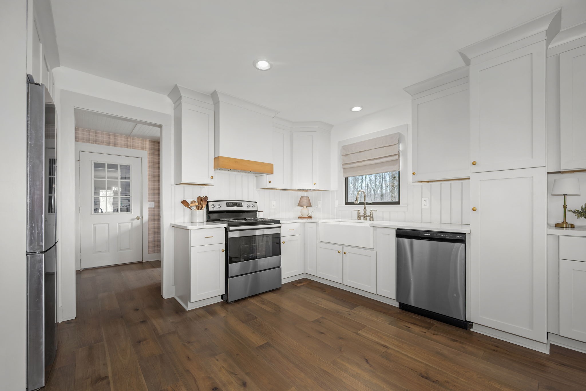 268 Davis Road Wartrace, TN 37183 - Photo 27 of 74 a kitchen with granite countertop white cabinets and stainless steel appliances