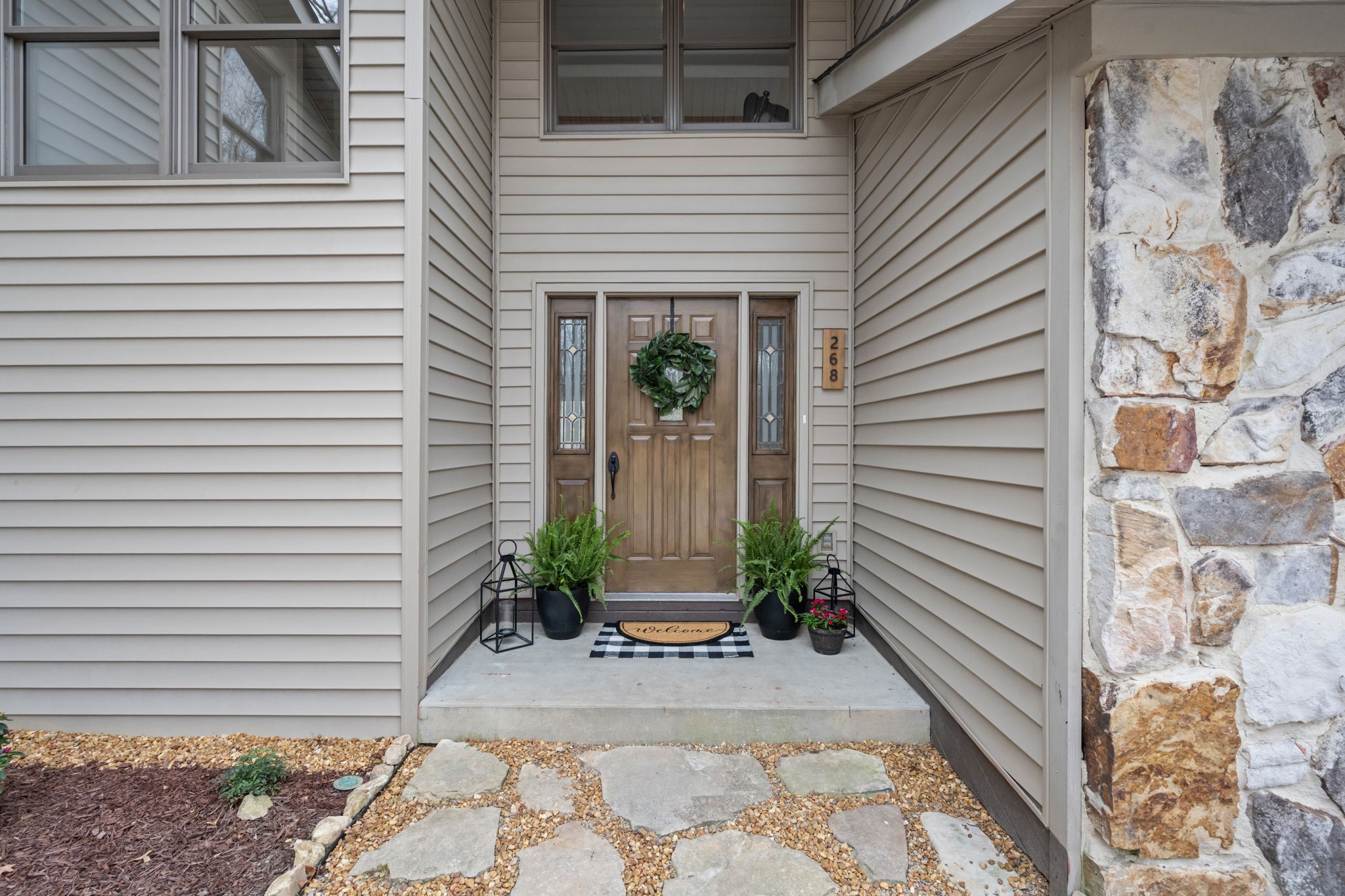 268 Davis Road Wartrace, TN 37183 - Photo 4 of 74 a front view of a house with garden