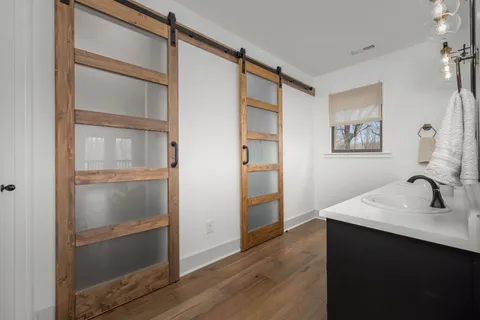 a house with swimming pool in front of it