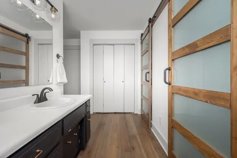 a view of outdoor space with deck and trees