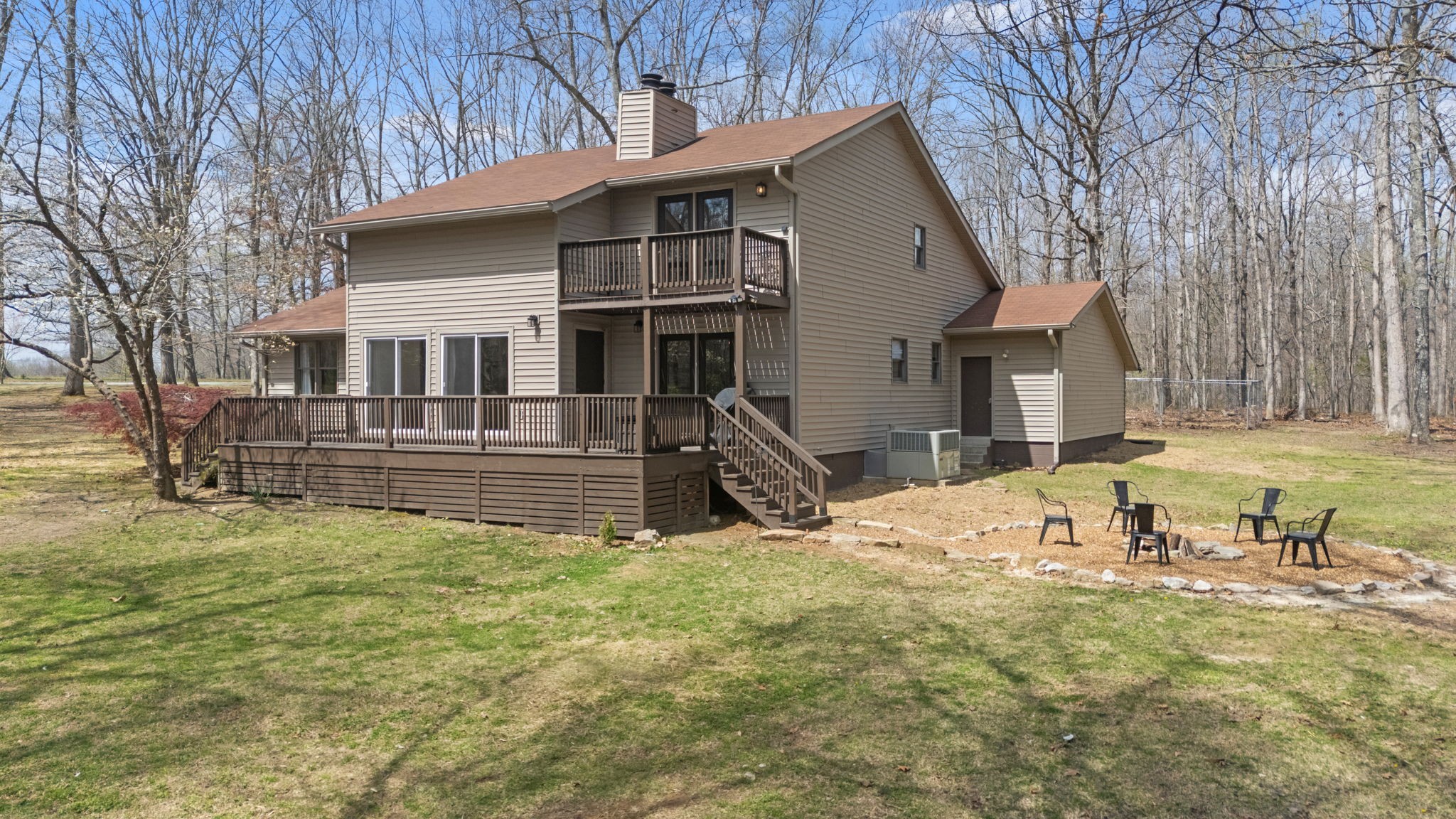 268 Davis Road Wartrace, TN 37183 - Photo 61 of 74 a view of a house with a yard patio and fire pit