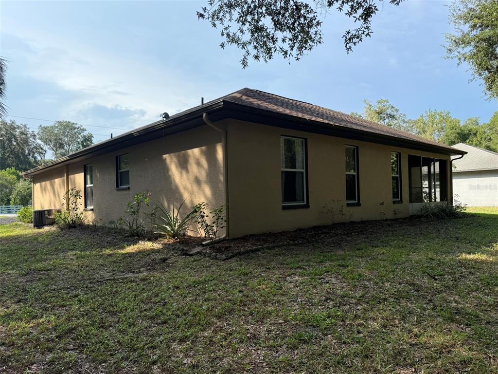 9735 West Dunnellon Road, Unit 31 Crystal River, FL 34428 - Photo 12 of 55 a view of a house with backyard