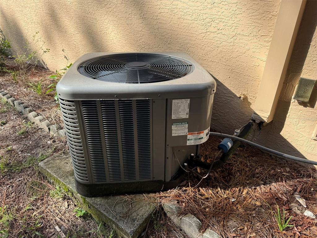 9735 West Dunnellon Road, Unit 31 Crystal River, FL 34428 - Photo 15 of 55 a front view of a house with a yard