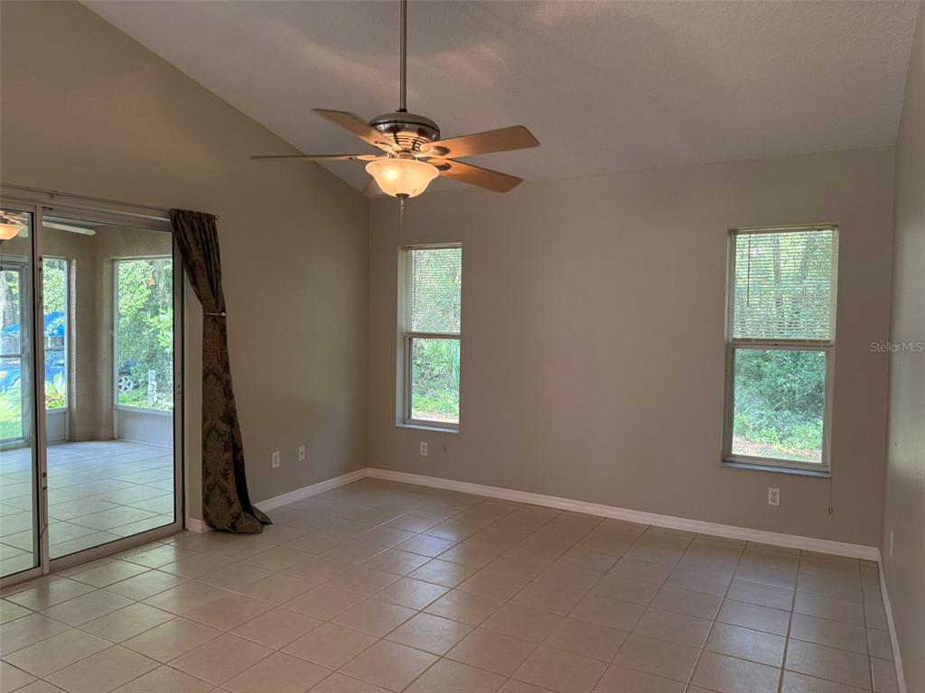 9735 West Dunnellon Road, Unit 31 Crystal River, FL 34428 - Photo 35 of 55 wooden floor in an empty room with a window