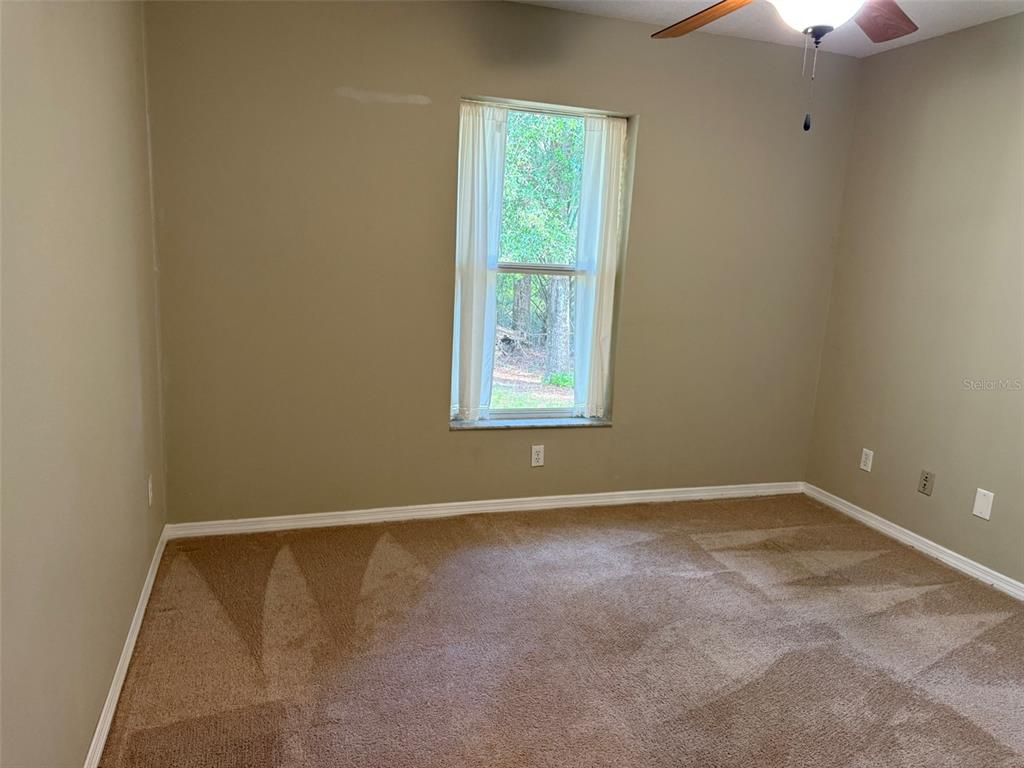 9735 West Dunnellon Road, Unit 31 Crystal River, FL 34428 - Photo 51 of 55 an empty room with a window