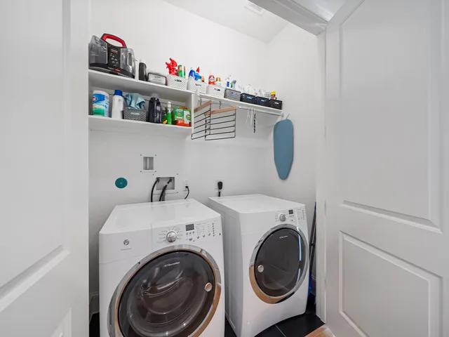 a view of washer and dryer in a utility room