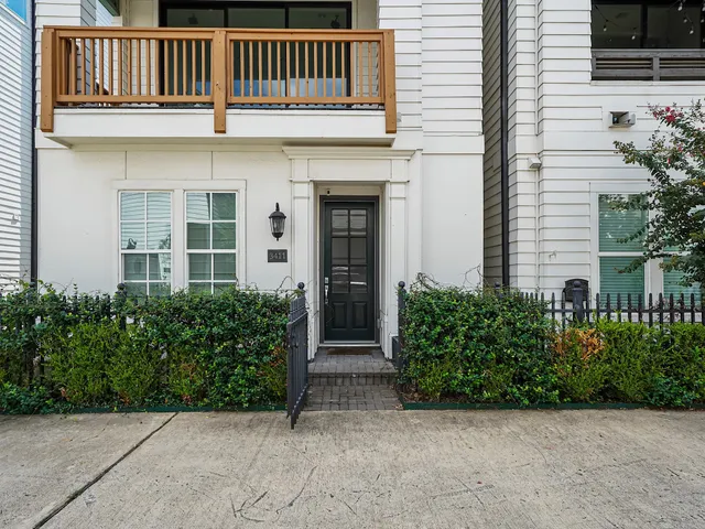 a front view of a house with garage