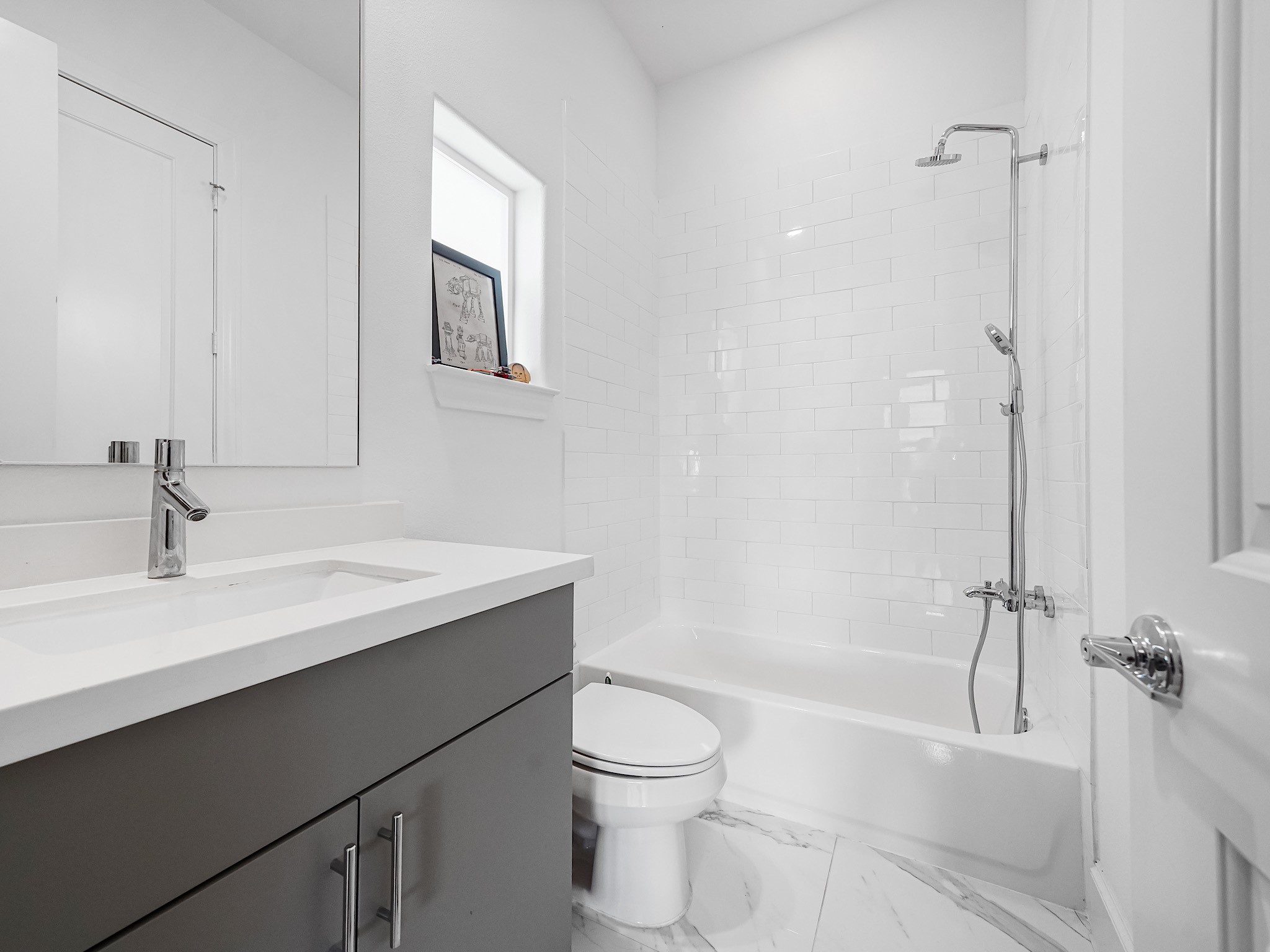 3411 Timbergrove Heights Street Houston, TX 77008 - Photo 8 of 33 a bathroom with a sink a toilet and a mirror