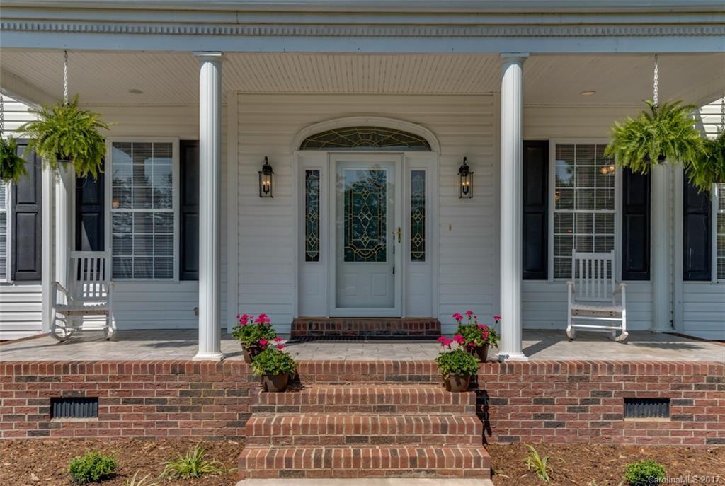 4144 Us 64/74a Road Rutherfordton, NC 28139 - Photo 2 of 24 a view of a house with potted plants
