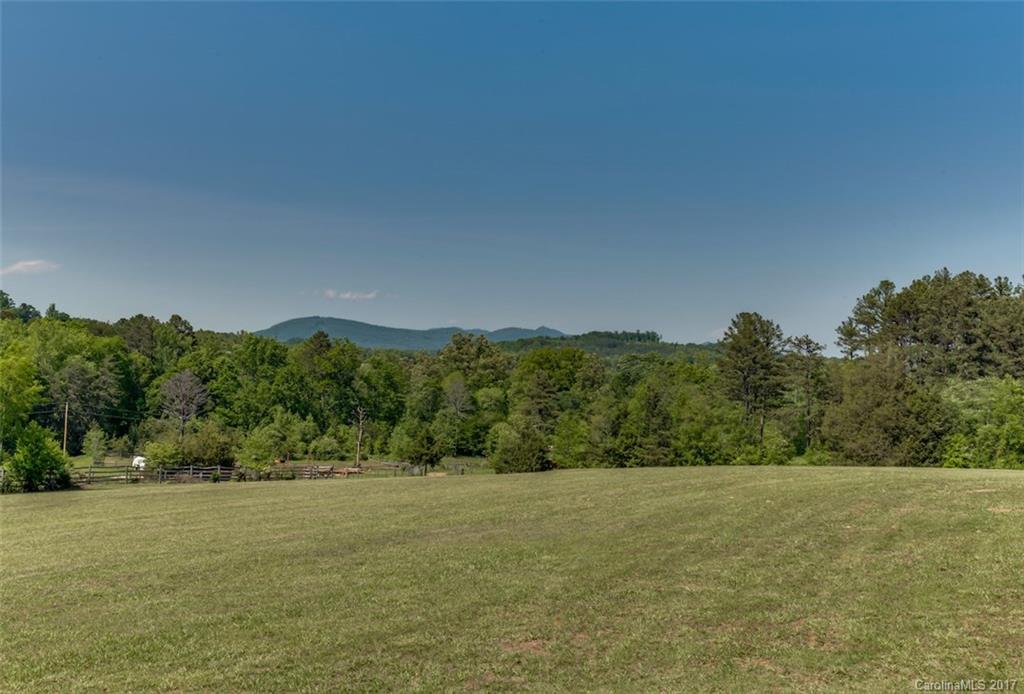 4144 Us 64/74a Road Rutherfordton, NC 28139 - Photo 3 of 24 a view of an lake and a mountain