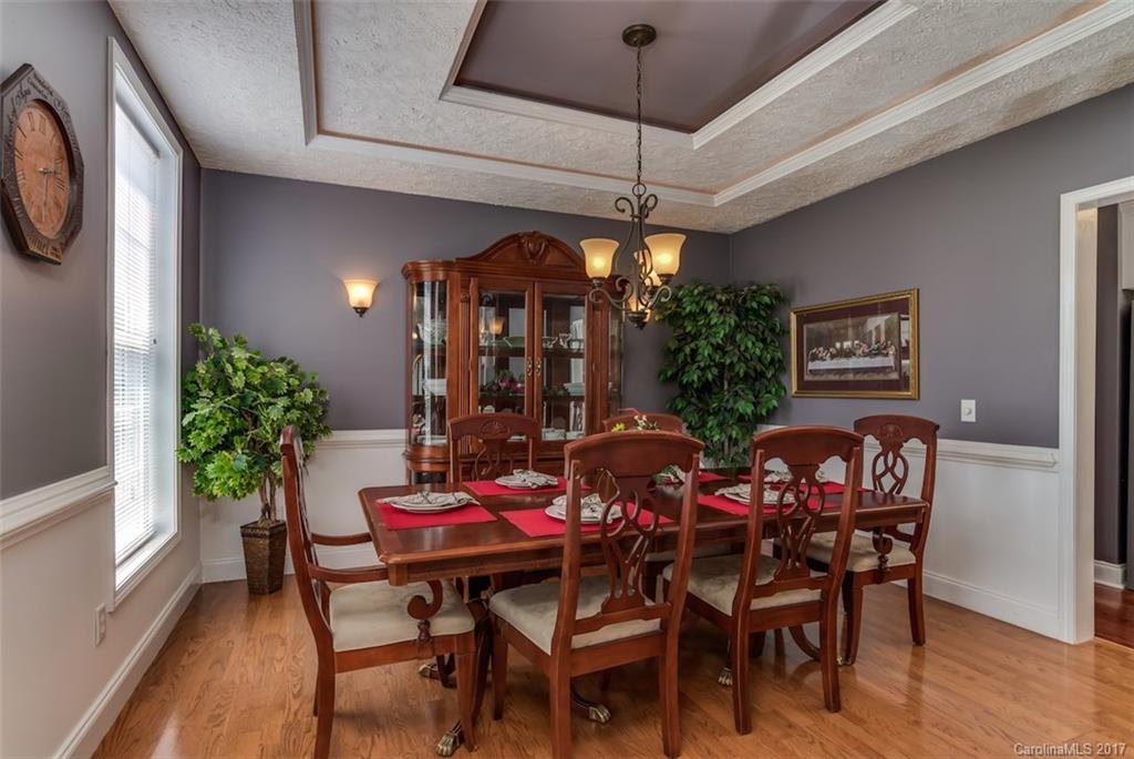 4144 Us 64/74a Road Rutherfordton, NC 28139 - Photo 5 of 24 a view of a dining room with furniture window and wooden floor