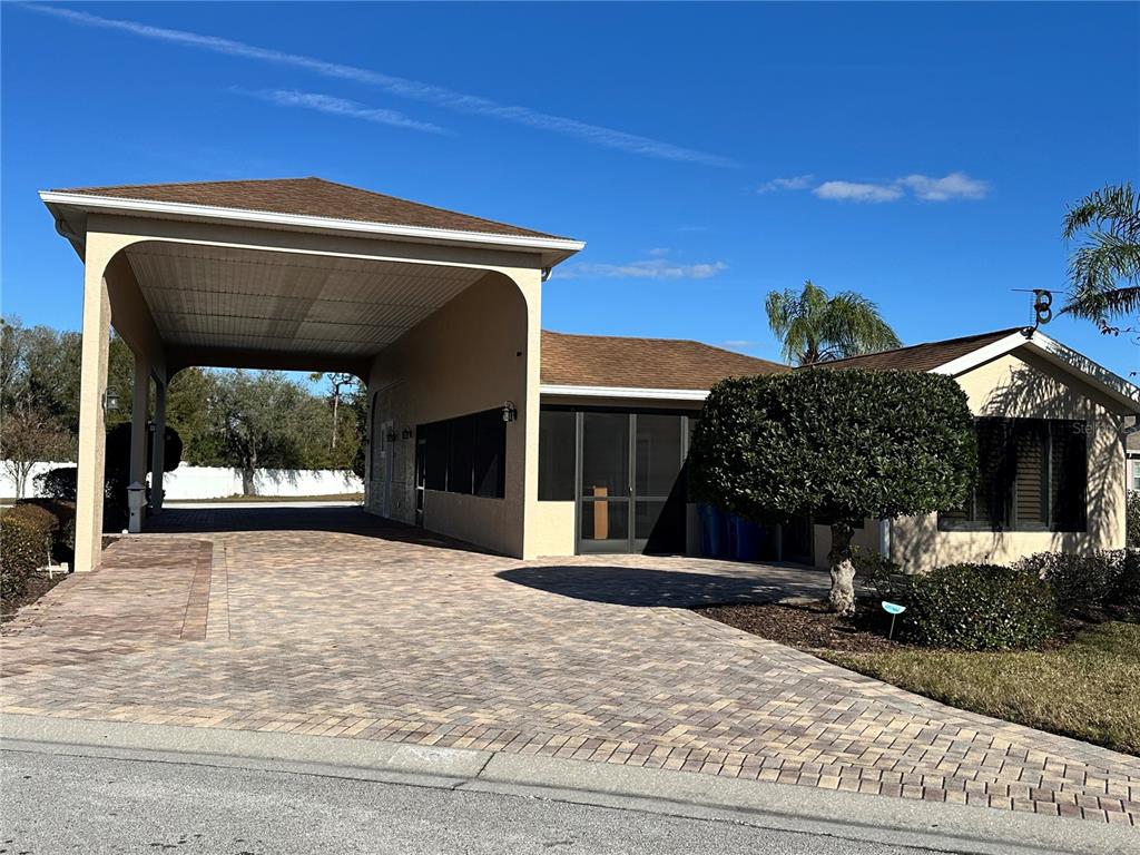 265 Laynewade Road Polk City, FL 33868 - Photo 1 of 1 a front view of a house with a yard